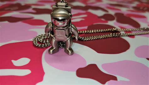 louis vuitton astronaut necklace fake|false louis vuitton prints.